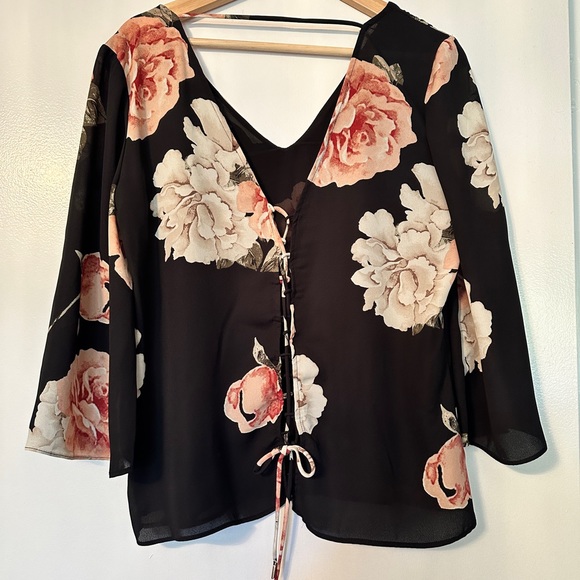Medium sized floral top from Dynamite with lace up back. - Picture 1 of 5